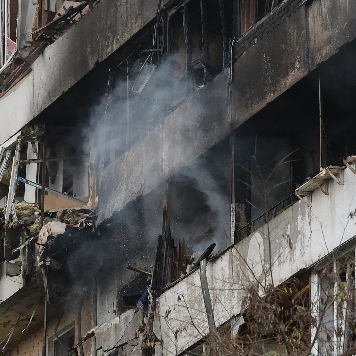 The site of a Russian strike on a residential building in Kyiv on Nov 25.