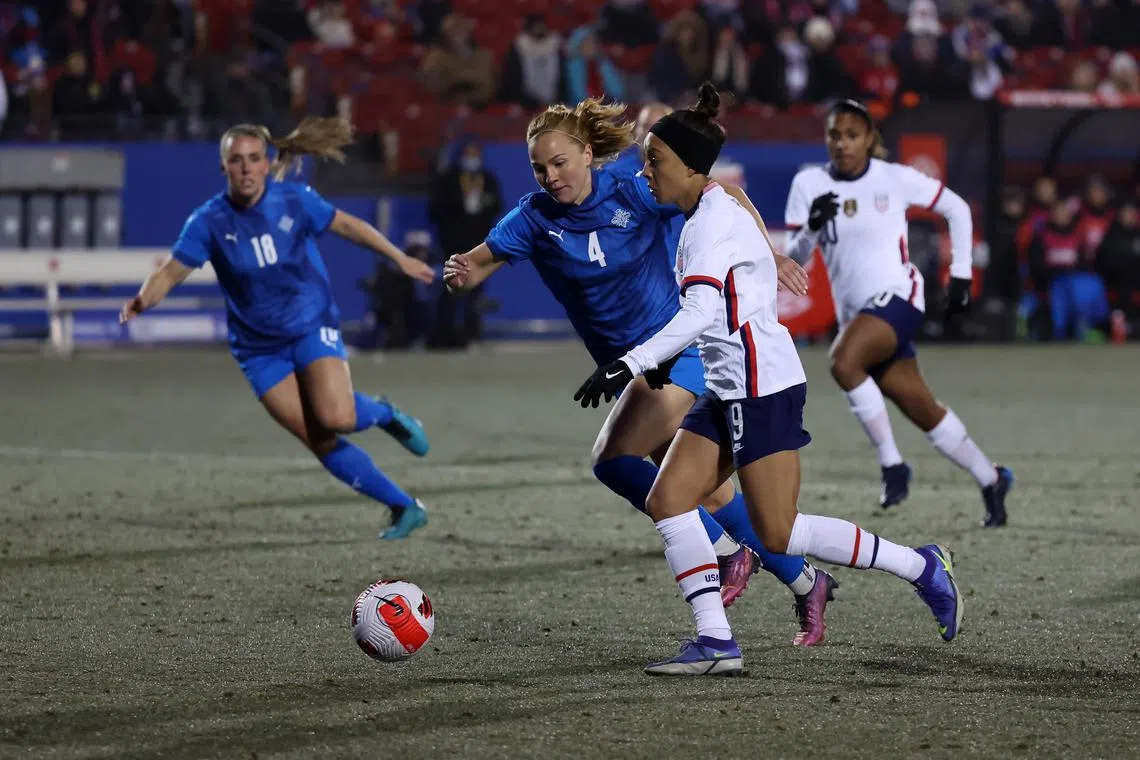 FILE PHOTO: Feb 23, 2022; Frisco, Texas, USA; USA forward Mallory Pugh (9) dribbles the ball around IceLand defender Glodis Perla Viggosdottir (4) during the first half of the 2022 She Believes Cup international soccer match at Toyota Stadium. Mandatory Credit: Kevin Jairaj-USA TODAY Sports/File Photo