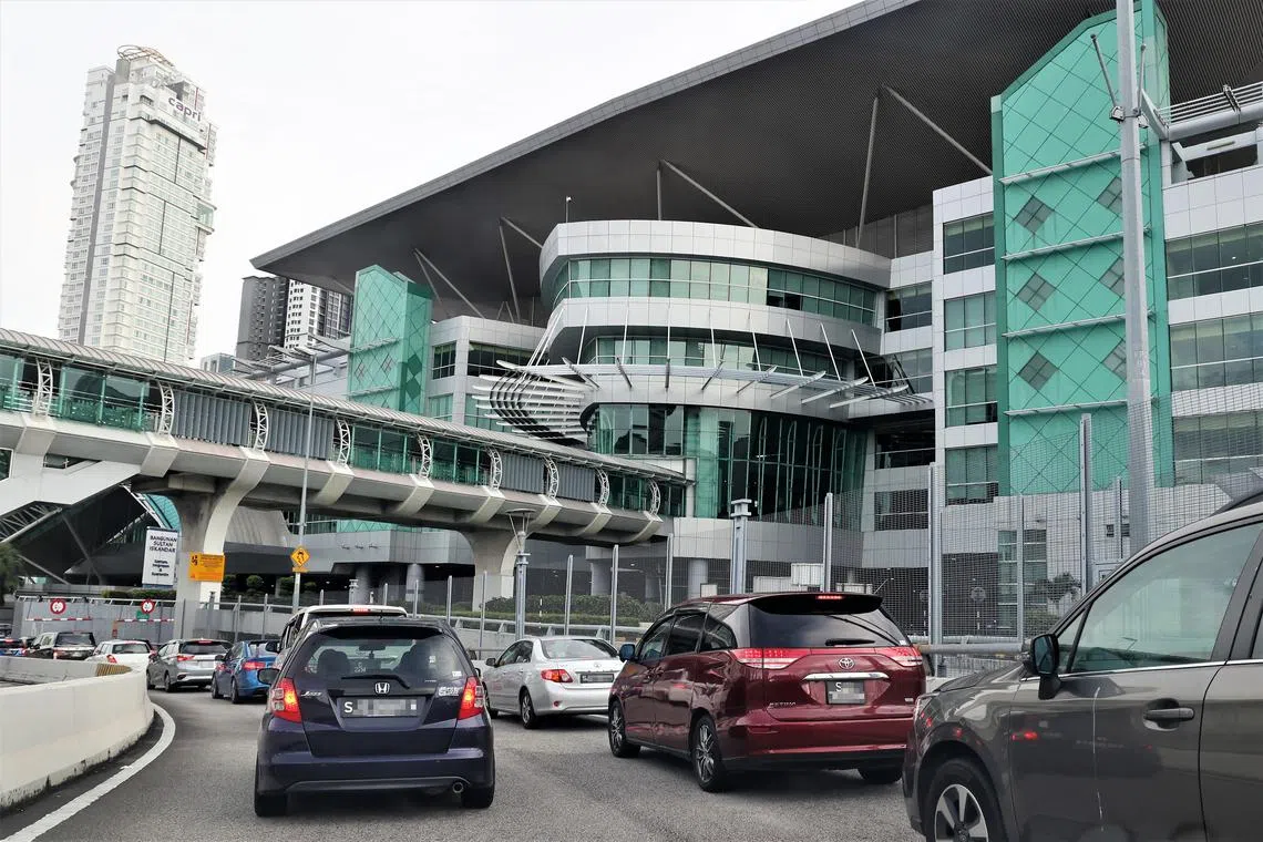 The suspects had allegedly asked the victim, who was going through immigration clearance, to pay RM2,000 (S$715) to avoid being arrested.