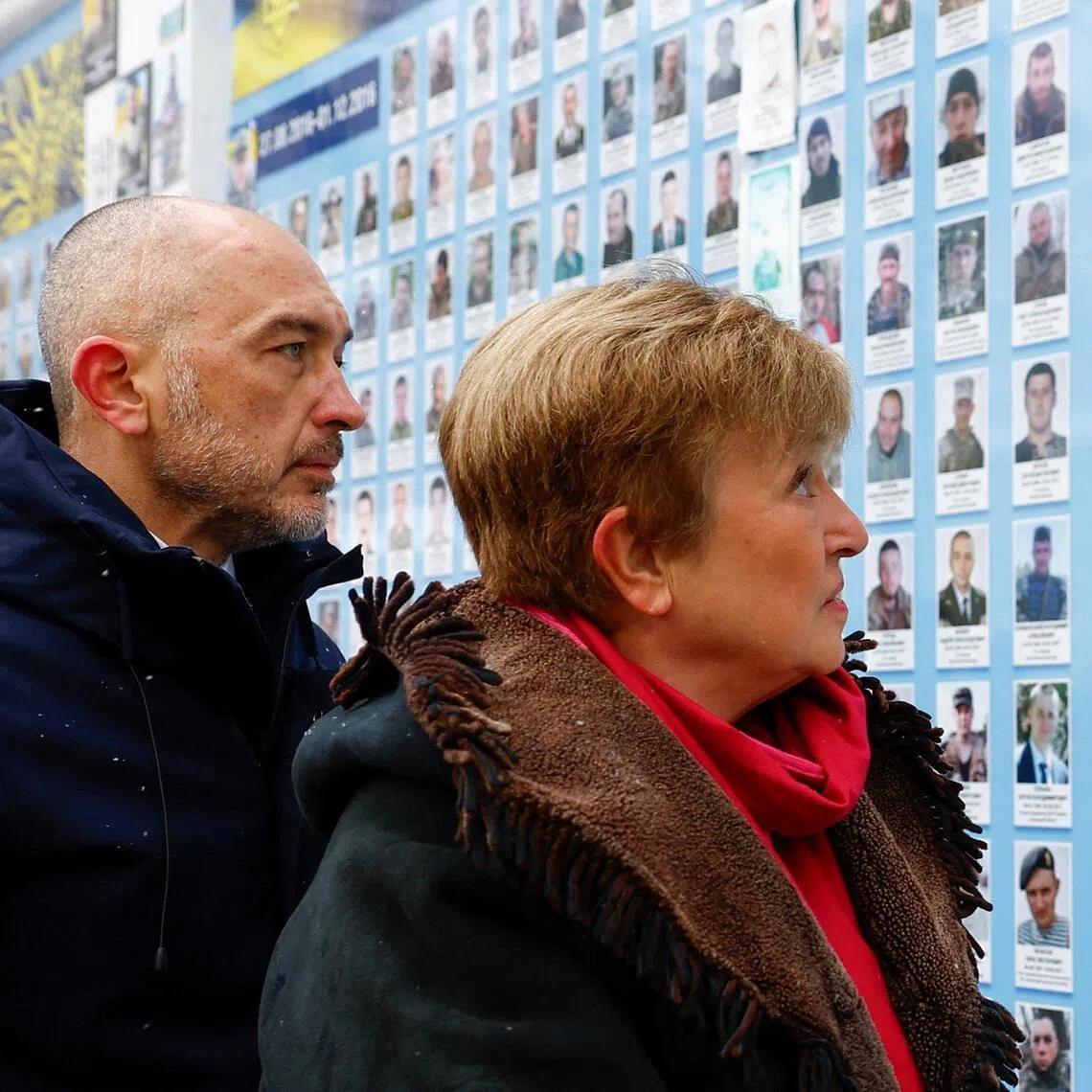 Governor of the National Bank of Ukraine Andriy Pyshnyi (left) and IMF managing director Kristalina Georgieva visiting the wall of remembrance for Ukraine's fallen soldiers, in Kyiv, on Jan 15.