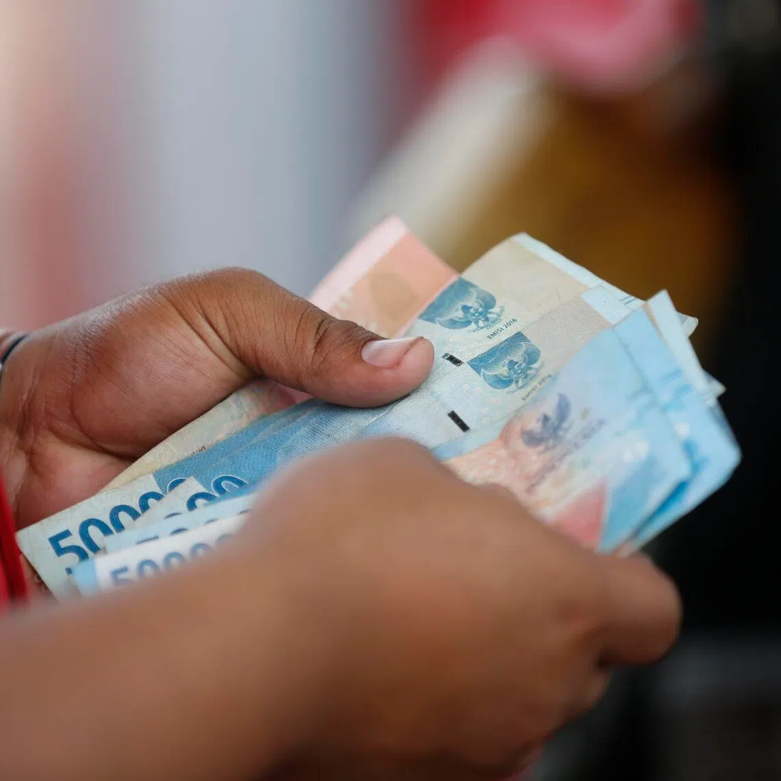 The rupiah is Asia’s worst-performing currency in 2026, driven by concerns that elevated oil prices will widen Indonesia’s budget deficit through higher energy subsidy costs.