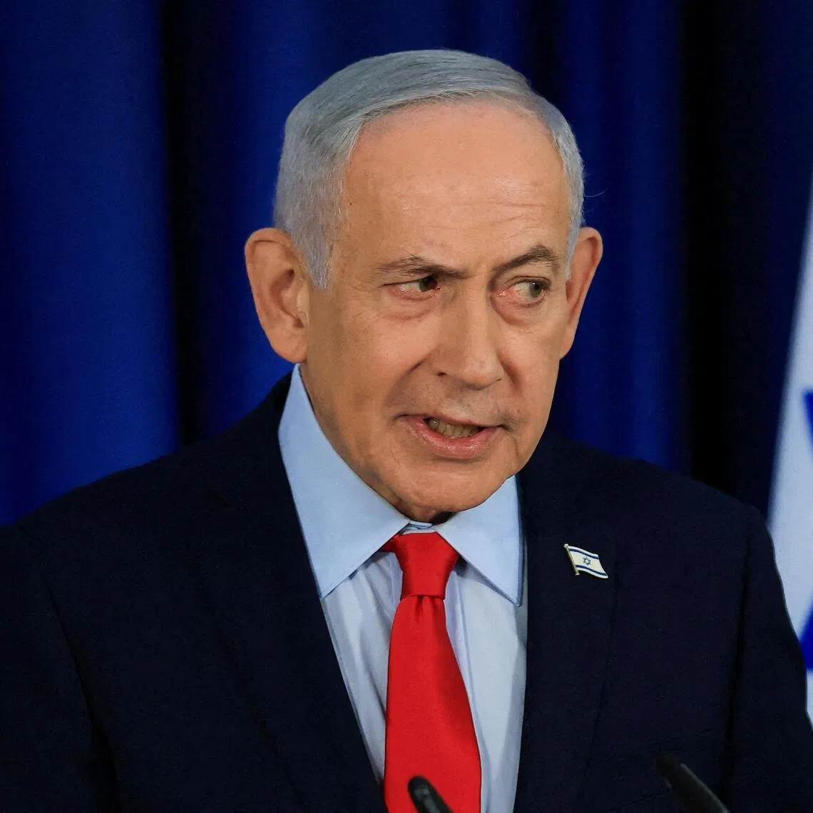 FILE PHOTO: Israeli Prime Minister Benjamin Netanyahu speaks during a press conference, amid the U.S.-Israel conflict with Iran, in Jerusalem, March 19, 2026. REUTERS/Ronen Zvulun/Pool     TPX IMAGES OF THE DAY/File Photo