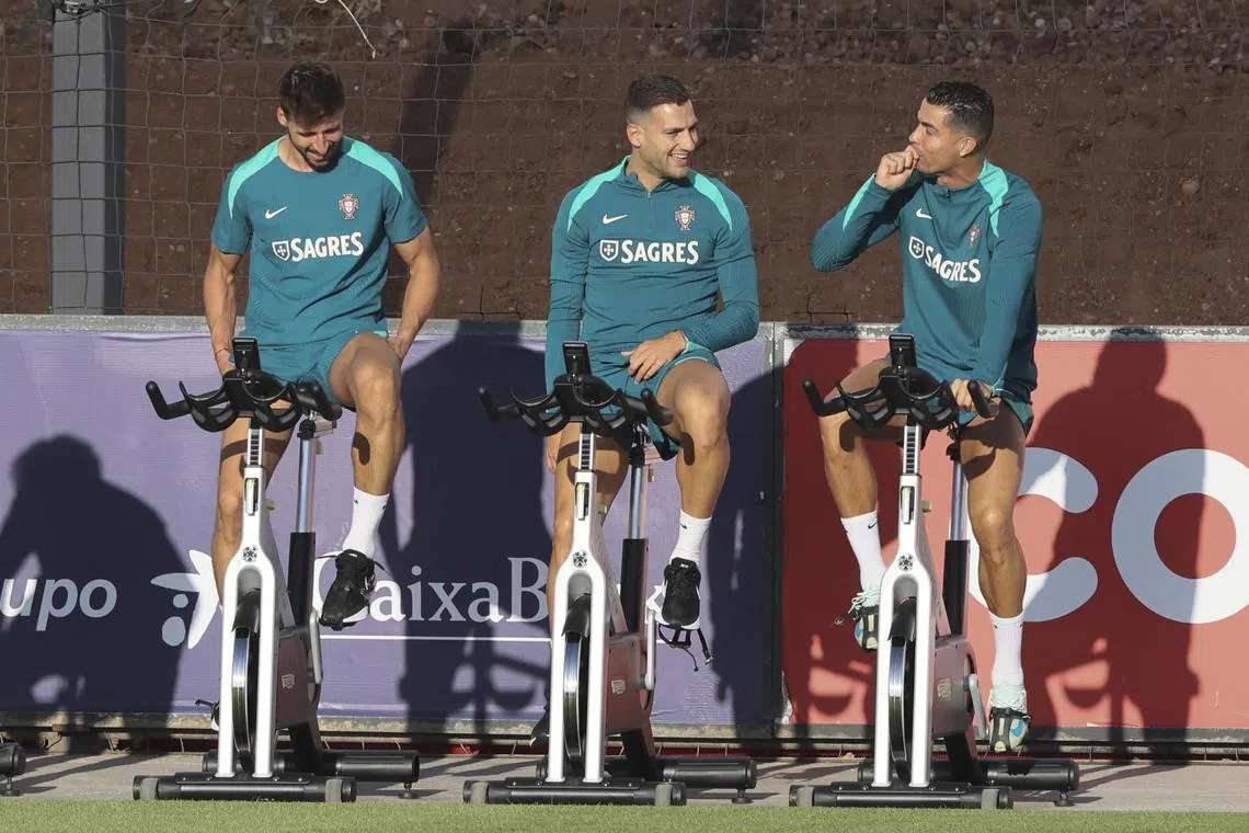 From left: Ruben Dias, Diogo Dalot and Cristiano Ronaldo during a training session ahead of Portugal's Nations League matches against Croatia and Scotland.