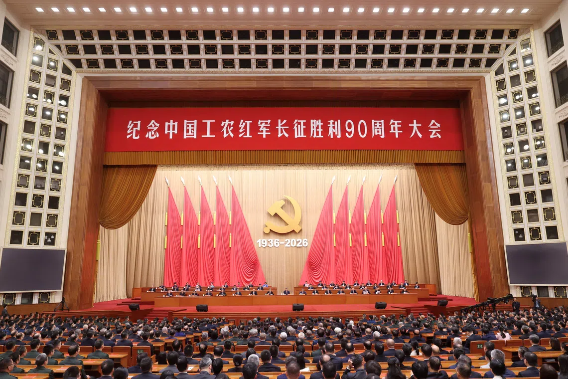 Chinese President Xi Jinping and other officials attend a gathering commemorating the 90th anniversary of the end of the Long March, at the Great Hall of the People in Beijing, China, October 22, 2026. cnsphoto via REUTERS