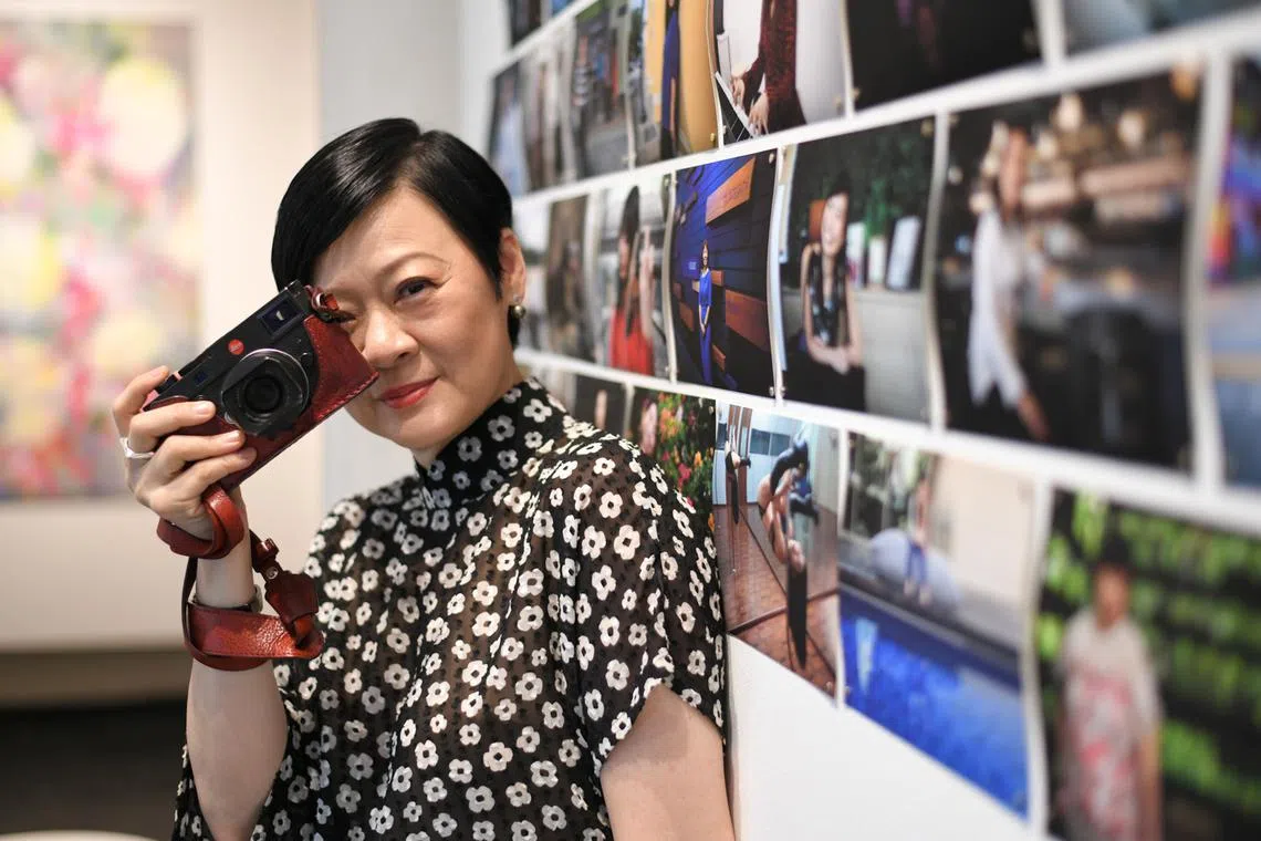 Obstetrician and gynaecologist Dr Chua Yang 's photobook, Women Inspiring Women – The National Edition, Women in Singapore Holding Up the Sky, features 100 women from all walks of life. ST PHOTO: 