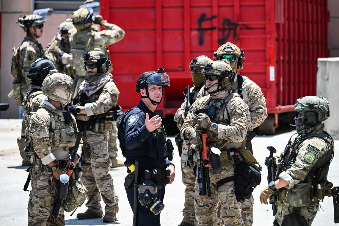 The national guard troops were providing security for federal law enforcement.