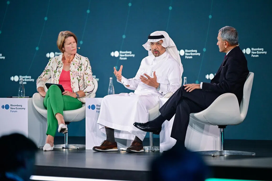 Saudia Arabia's Minister of Investment, Mr Khalid Al-Falih (center), speaking with Singapore's Foreign Minister Dr Vivian Balakrishnan at the Bloomberg New Economy Forum on Nov 8 at the Capella Singapore hotel. They are pictured with Ms Stephanie Flanders, Bloomberg's head of economics and government, who moderated the session.