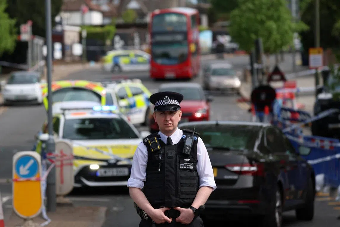 A police officer stands at the scene, after a man was arrested following a stabbing incident in the Golders Green area, which is home to a large Jewish population, in London, Britain, April 29, 2026. REUTERS/Hannah McKay