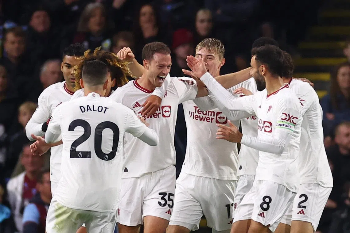 Manchester United's Jonny Evans (35) celebrates scoring against Burnley on Sept 23. The goal was later disallowed after a VAR review.