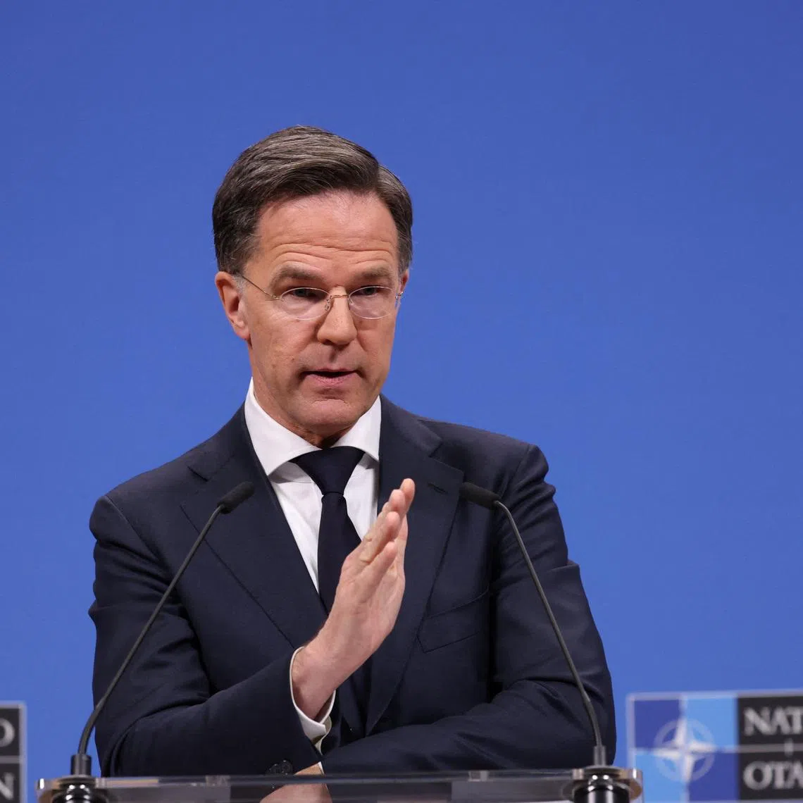 NATO Secretary General Mark Rutte gestures during a press conference to present his 2025 Annual Report, at NATO headquarters in Brussels, Belgium March 26, 2026. REUTERS/Omar Havana