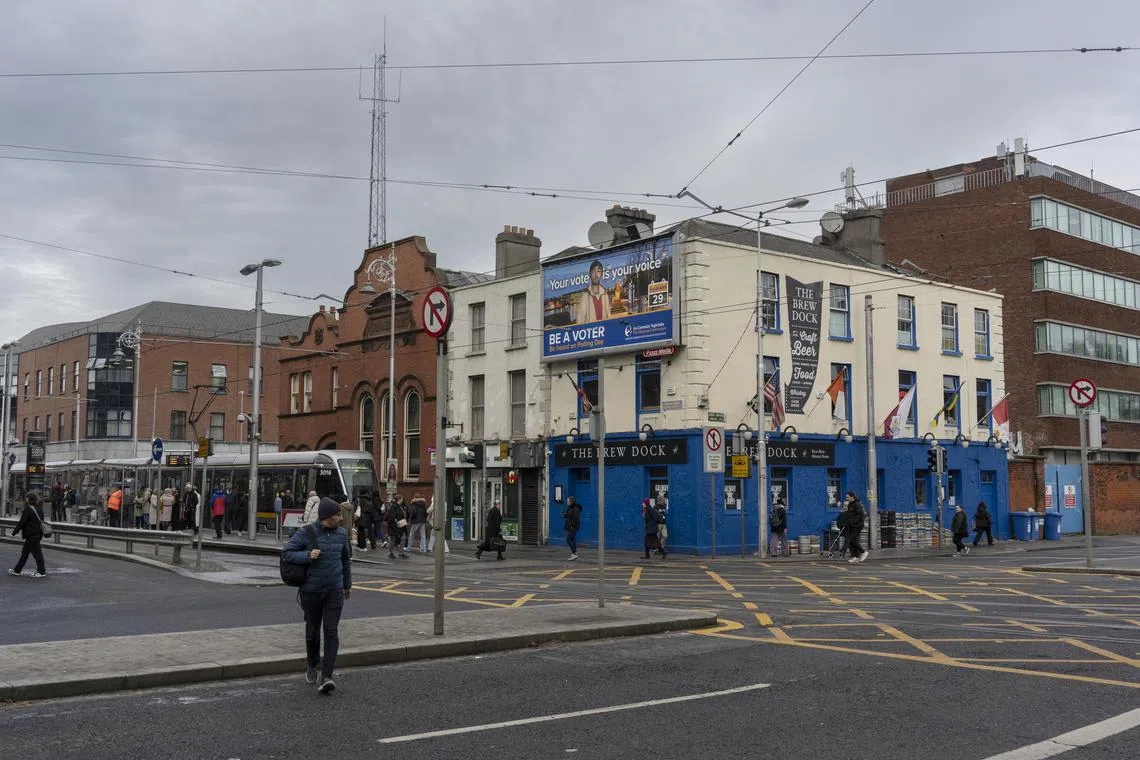 A billboard encouraging registration to vote on the side of a pub in Dublin on Nov 28.
