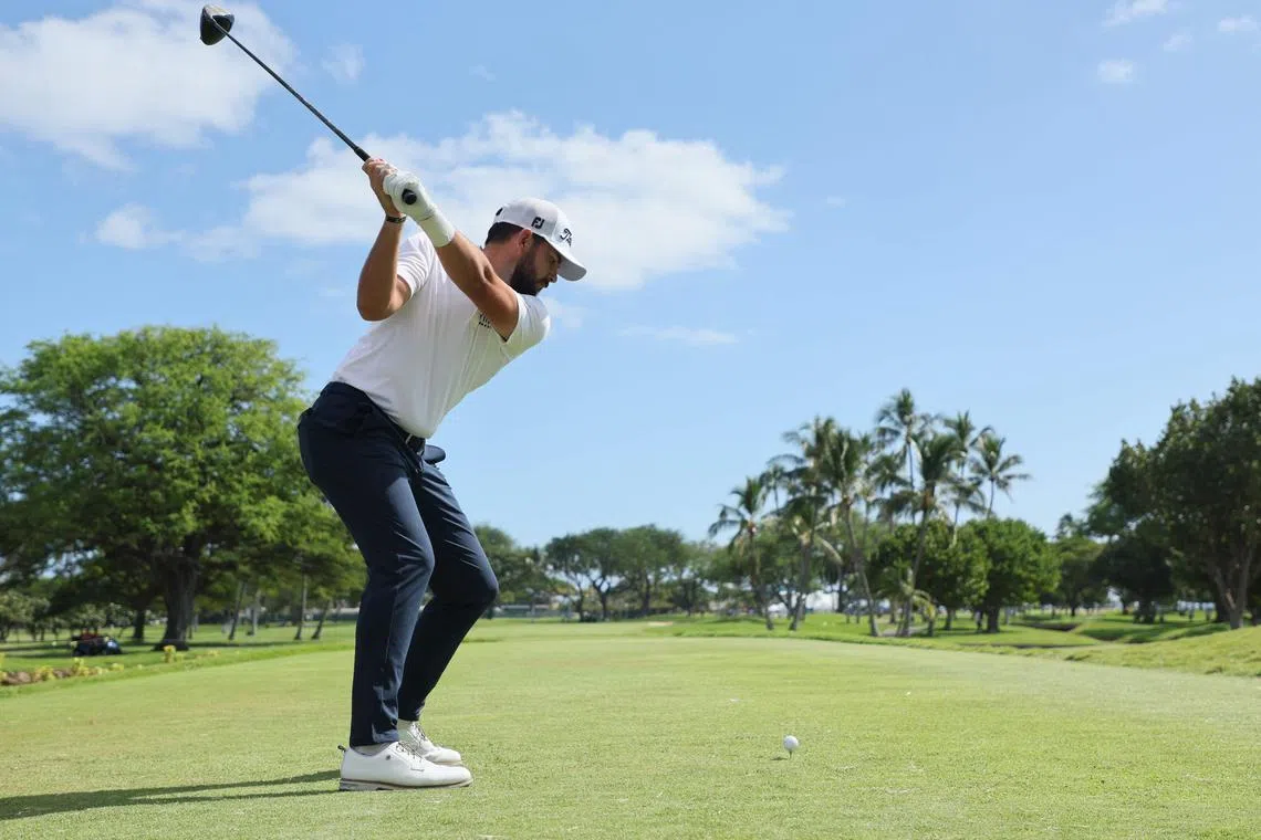 Hayden Buckley of the United States plays his shot from the 13th tee during the third round of the Sony Open in Hawaii.