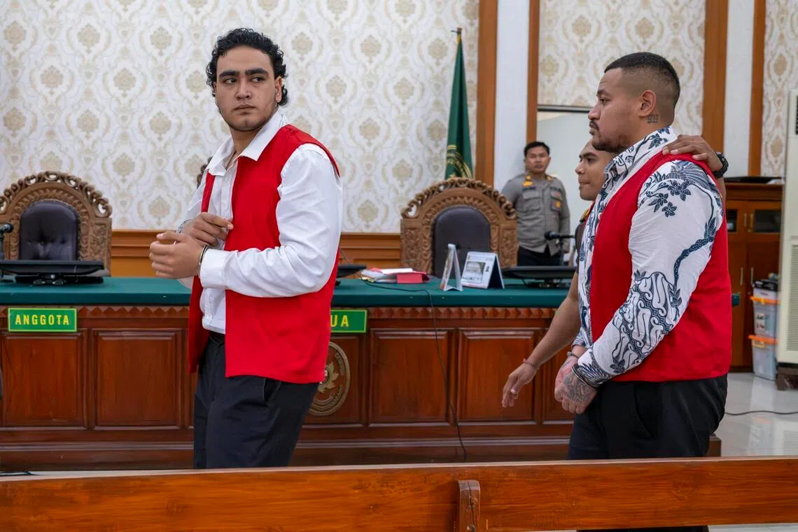 Gunmen Paea-I-Middlemore Tupou (left) and Mevlut Coskun at the Denpasar District Court on March 9.