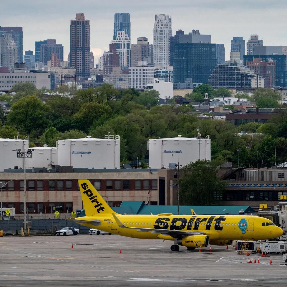 A Spirit Airline plane sits on the tarmac at LaGuardia Airport in Queens, in New York City, U.S., May 2, 2026. REUTERS/David 'Dee' Delgado 
