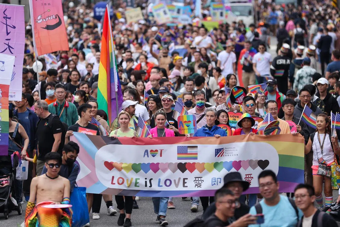 The streets of central Taipei were packed for the annual parade, the 21st since it began and including go-go dancers and drag queens.
