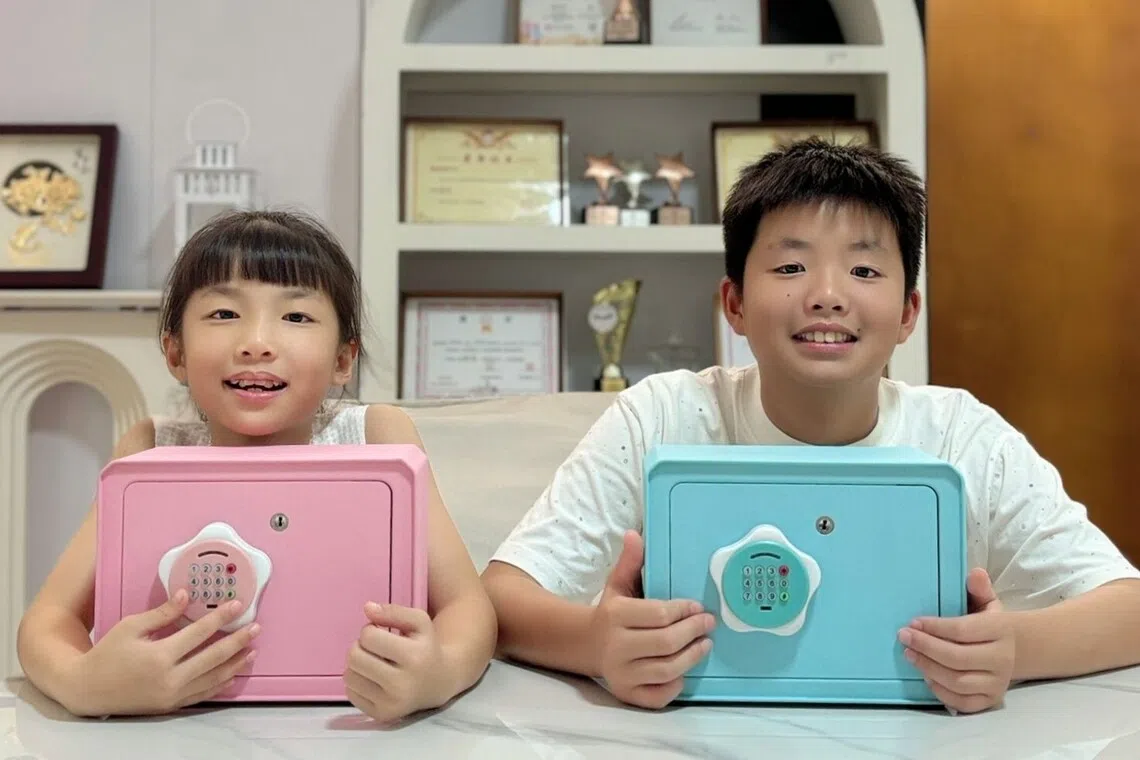 Siblings Oscar, 11, and Olivia, 9, are learning to manage their own allowance. Their parents Thomas Woo and Candy Meng encourage the children to save about 10 to 20 per cent of their allowance in their piggy banks.