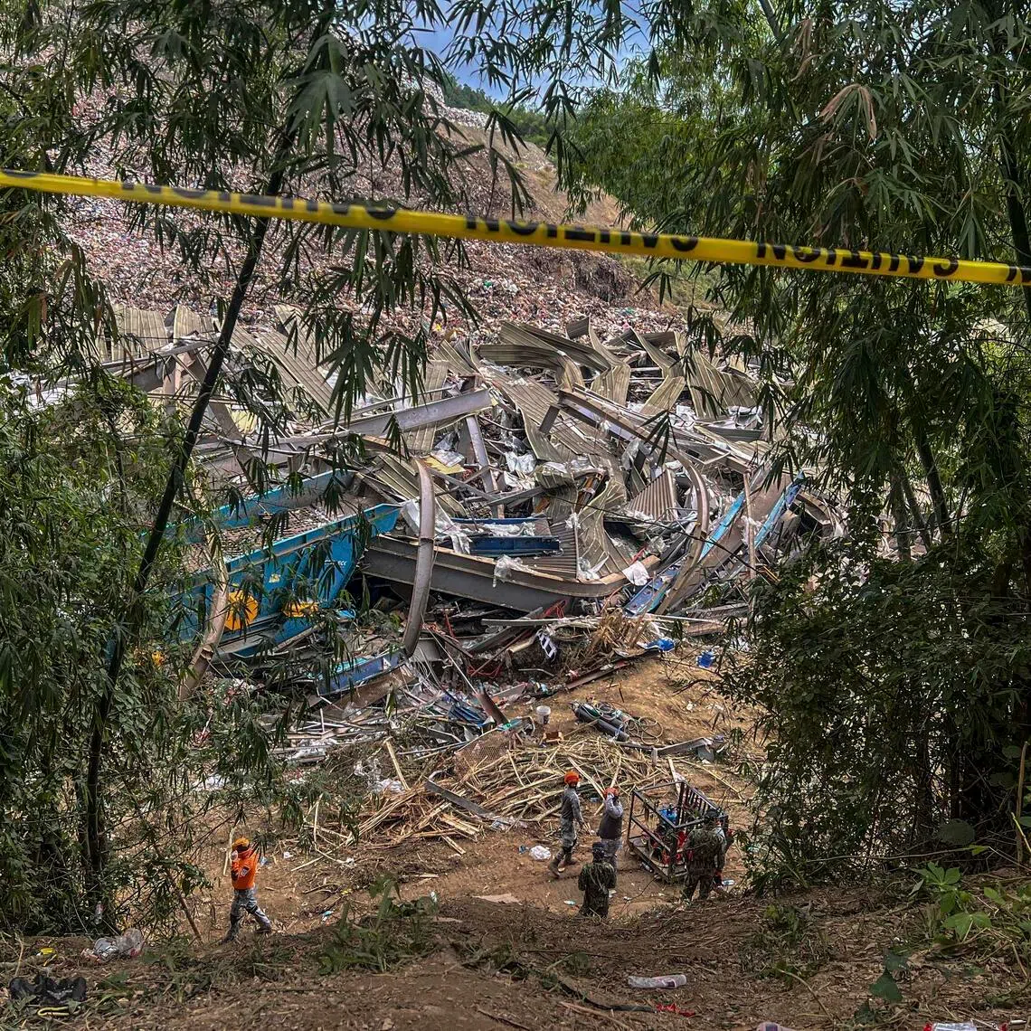 epa12639781 A view of an affected area at the site of a waste landfill collapse in Binaliw village in Cebu City, central Philippines, 10 January 2026. At least three people were killed and 34 remain missing following a collapse at the landfill 08 January, as local emergency response units continue search operations.  EPA/JUANITO ESPINOSA