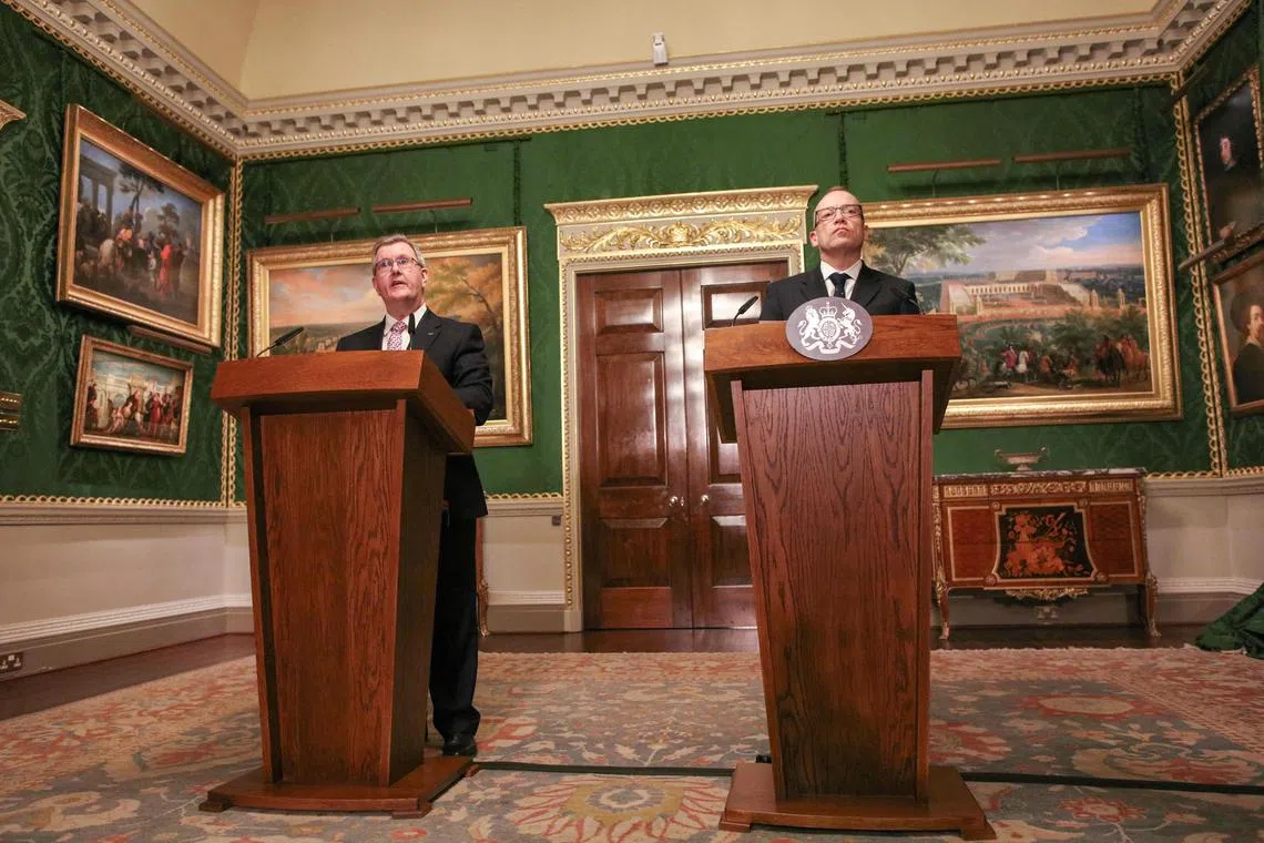 Northern Ireland's DUP leader Jeffrey Donaldson (left) and Britain's Northern Ireland Secretary Chris Heaton-Harris host a joint press conference in Northern Ireland on Jan 31.