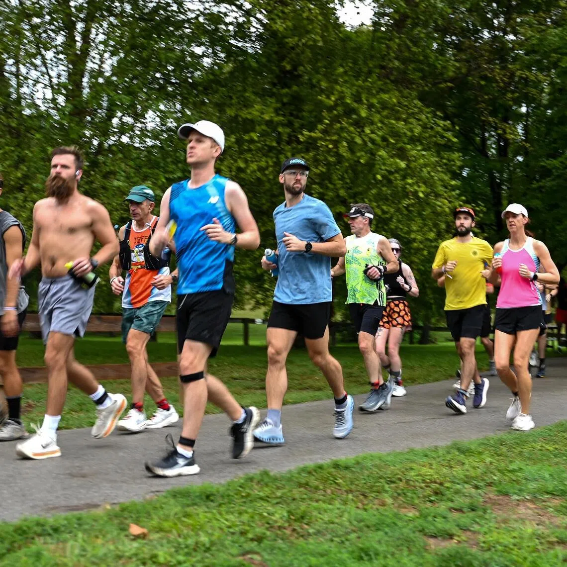 Runners during the Prairie on Fire backyard ultra, in Cicero, Indiana, on Sept 12.