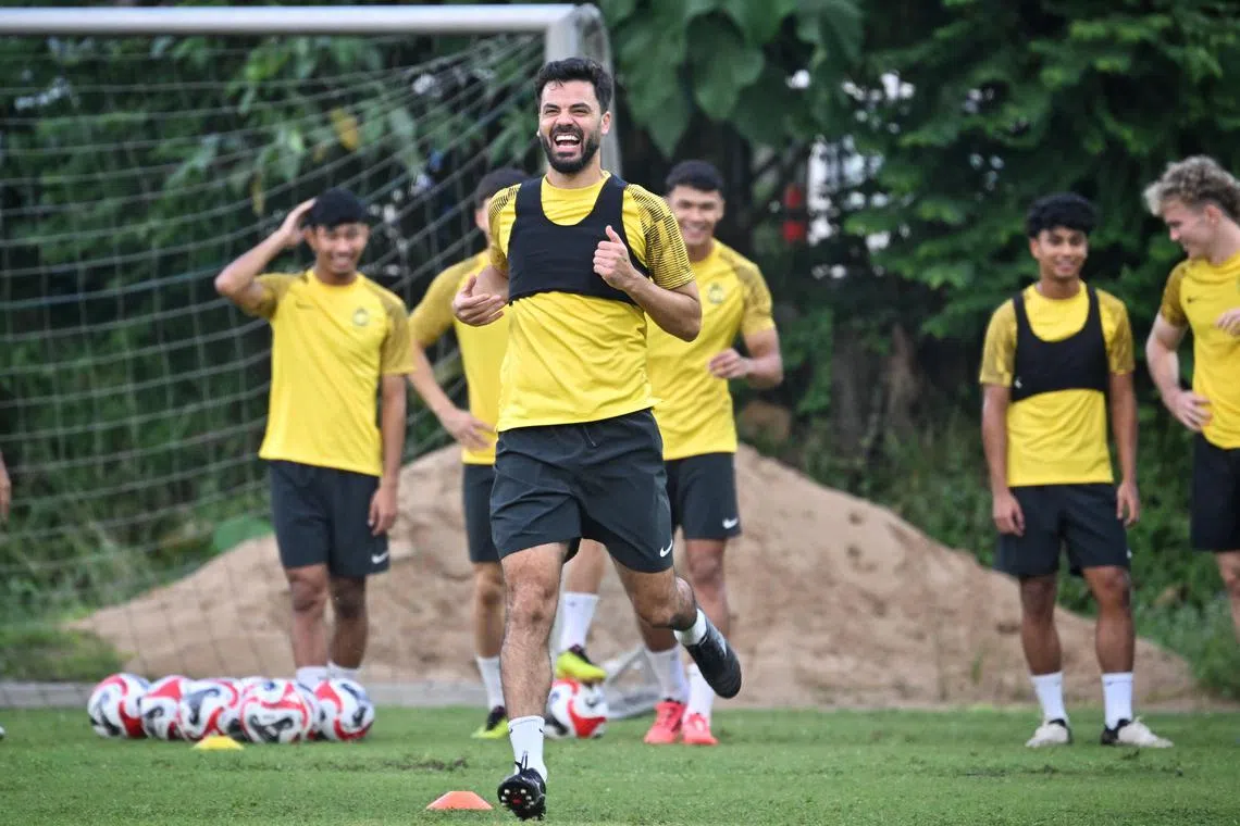 Paulo Josue (centre) in high spirits during Malaysia's training at Wisma FAM on Dec 19. The 35-year-old Brazil-born striker is set to lead the lines for Malaysia when they host Singapore in their final 2024 Asean Cup Group B match at the Bukit Jalil Stadium on Dec 20.