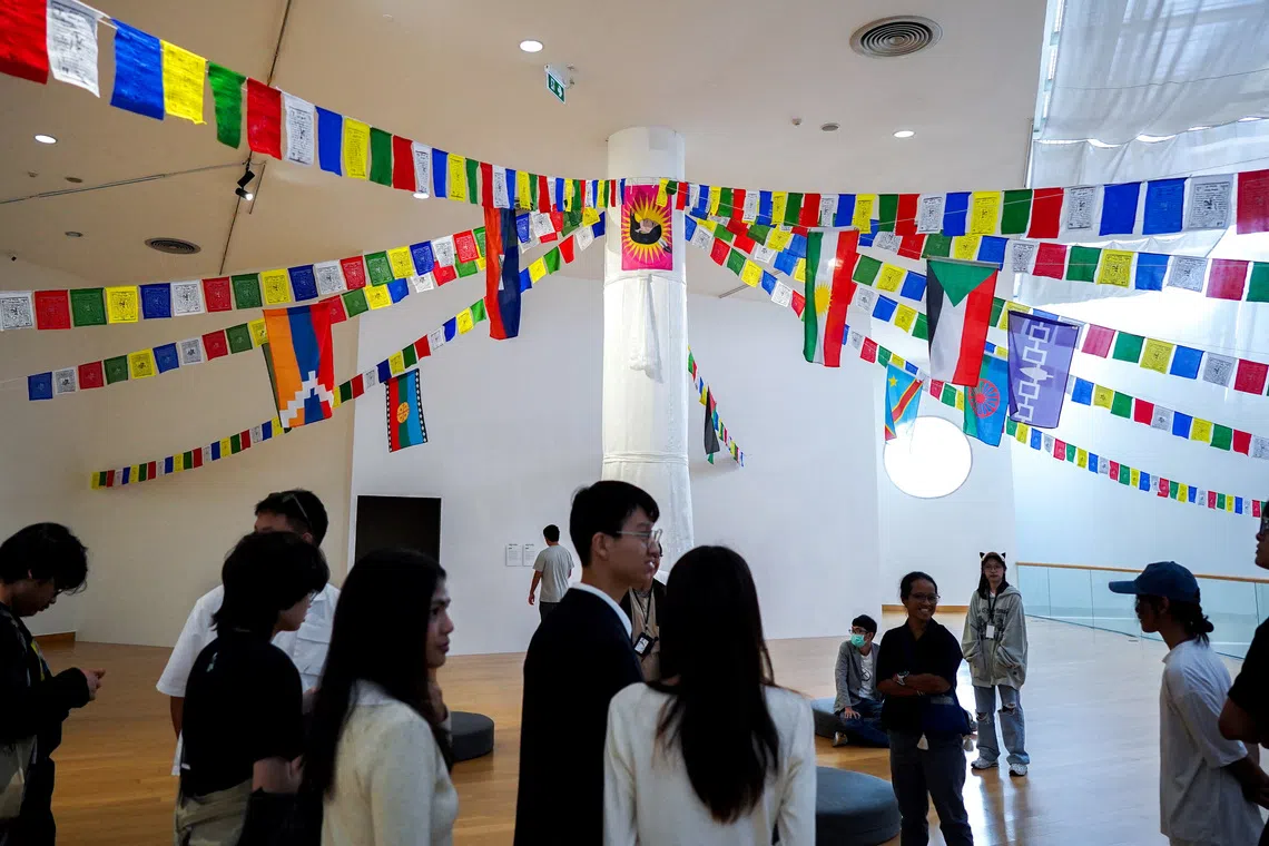 People attend the exhibition titled “Constellation of Complicity" at the Bangkok Arts and Cultural Centre in Bangkok, on Aug 7.