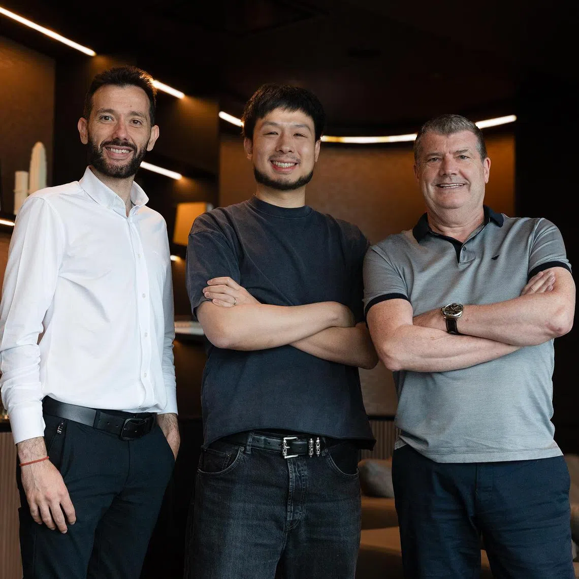 Valencia CF president Kiat Lim (centre) with newly hired chief executive officer Ron Gourlay (right) and manager Carlos Corberan.