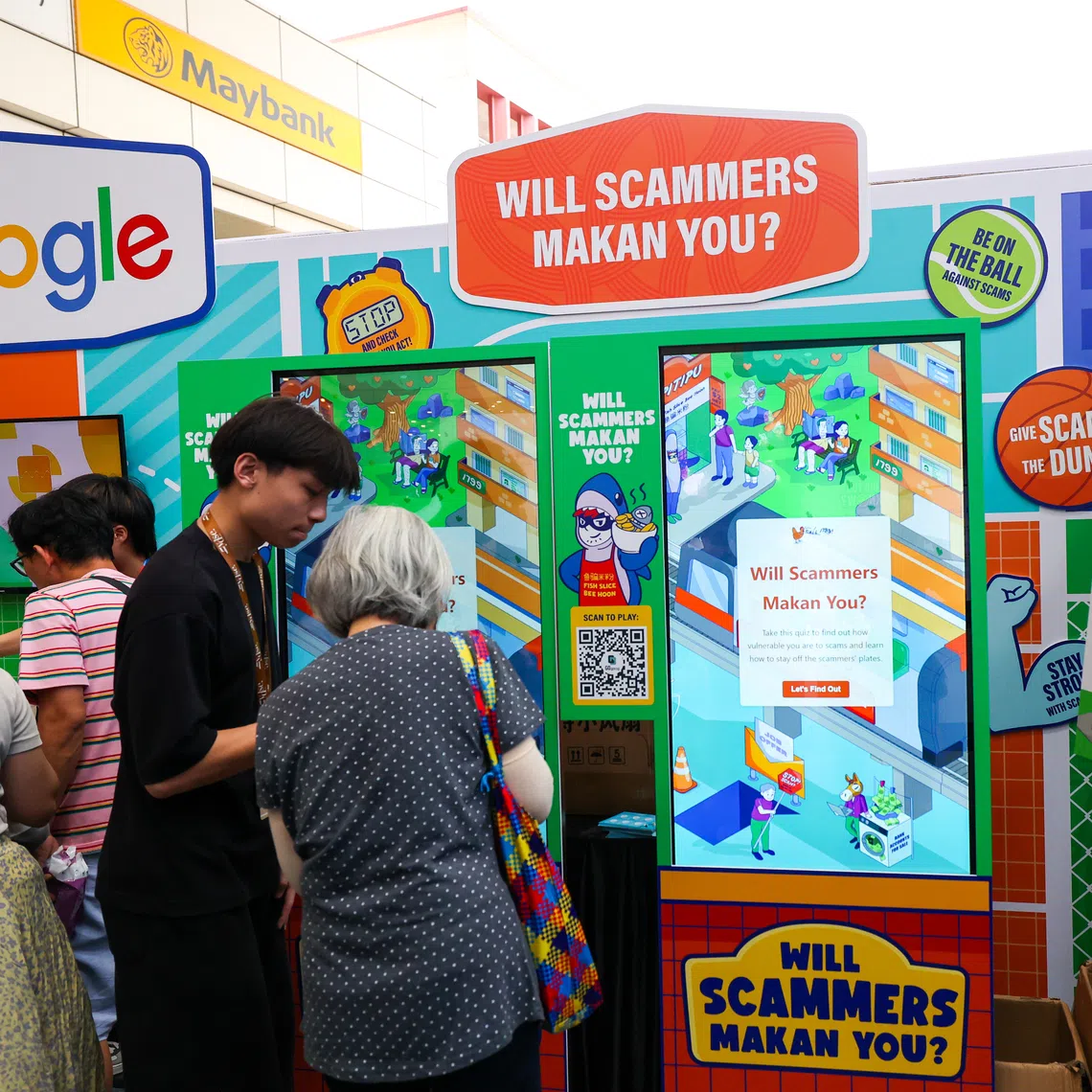 Visitors at the launch of the inaugural National Anti-Scam Roadshow at Toa Payoh HDB Hub Atrium on Nov 8.