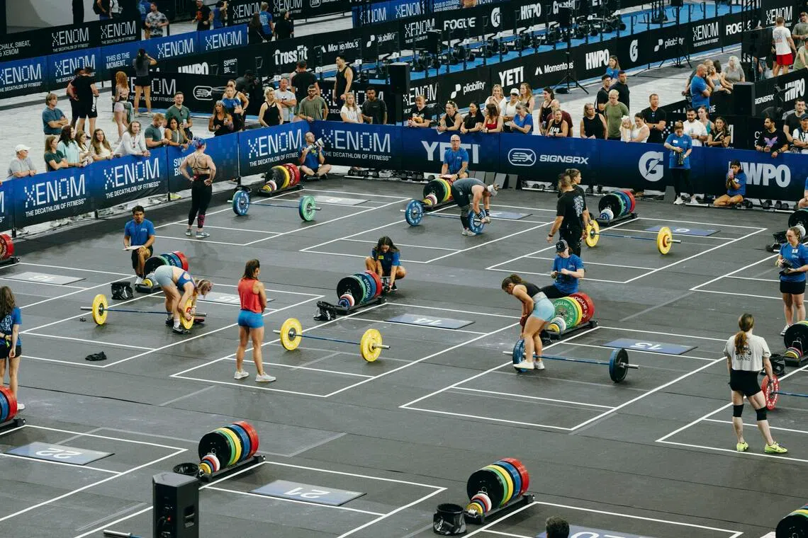 Workout enthusiasts competing against one another at a Xenom event at Star arena in Frisco, Texas, on June 27.