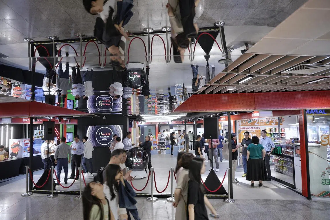 The facade of Hive by Stellar Lifestyle at basement one of Esplanade Xchange on Jan 22, 2024. Hive 2.0 introduces about 10 unique retail experiences focusing on automation, robotics and digital retail services. This includes 7-Eleven’s first self-checkout store in Singapore, room-sized robotic retail dispensing machines, and self-navigating robots that traverse common spaces, security gantries and lifts when delivering orders.

ST PHOTO: KEVIN LIM arhive22