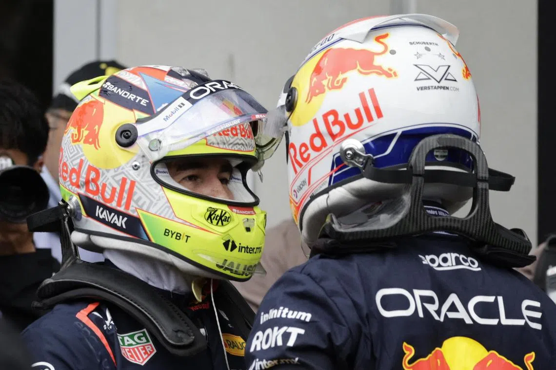 Red Bull drivers Max Verstappen with Red Bull's Sergio Perez exchanged sharp words after an opening lap battle that saw Verstappen run wide on the grass.