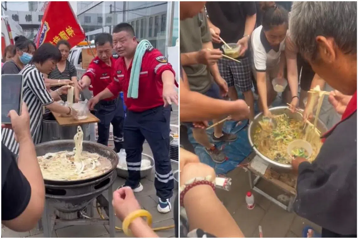 Mr Zhao Zhansheng (centre, in red) prepared hand-pulled noodles to feed local residents and rescuers passing by.