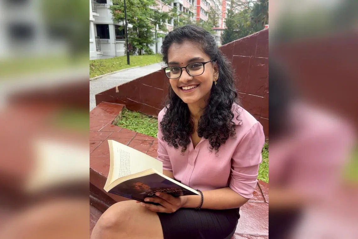 Ms Vishnu Vardni Anandan, member of the Tamil Language Council, with her favourite book, The Best I Could by Subhas Anandan. 