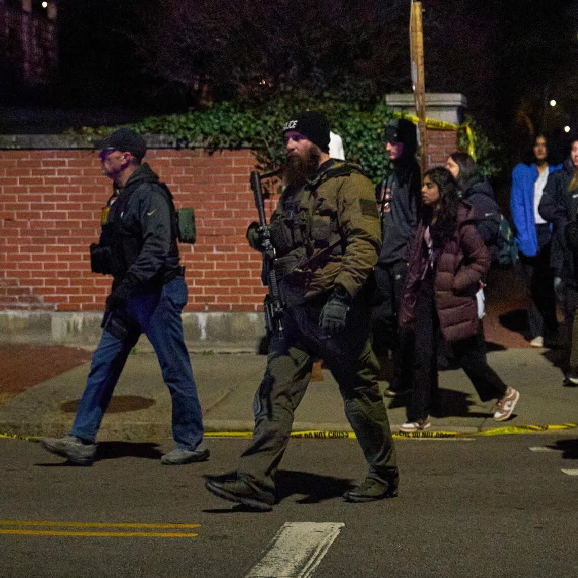 The shooting at Brown University brought hundreds of police officers in helmets and armour to campus.
