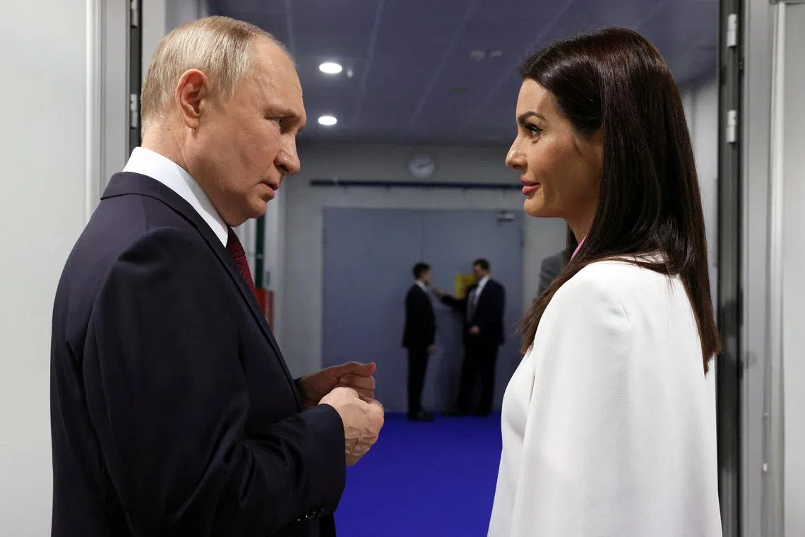 FILE PHOTO: Russian President Vladimir Putin meets with Yevgenia Gutsul, head of the semi-autonomous Gagauzia region in Moldova, on the sidelines of the World Youth Festival in the federal territory of Sirius near Sochi, Russia, March 6, 2024. Sputnik/Mikhail Metzel/Pool via REUTERS/File Photo