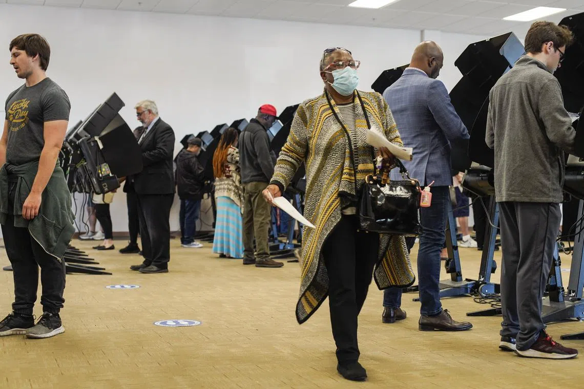Voters cast their ballots on the final day of early voting in Columbus, Ohio, on Nov 7, 2022.