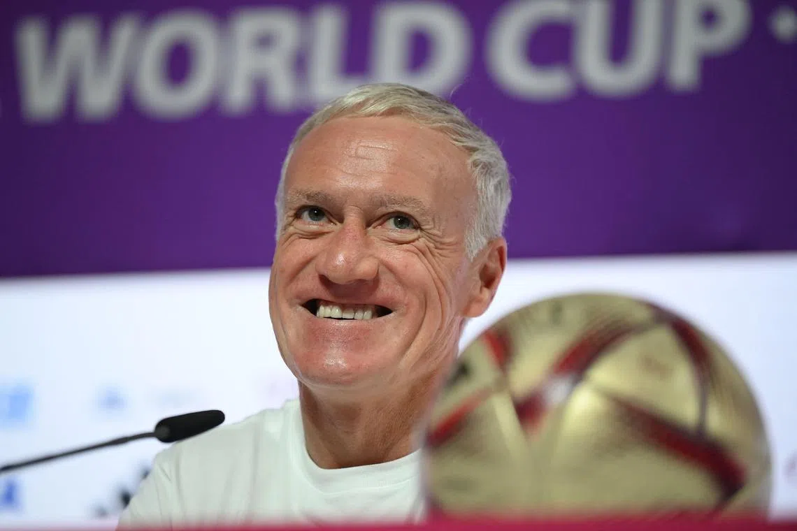 France's coach Didier Deschamps attends a press conference in Doha on Tuesday, a day ahead of the Qatar 2022 World Cup football semi-final match against Morocco.