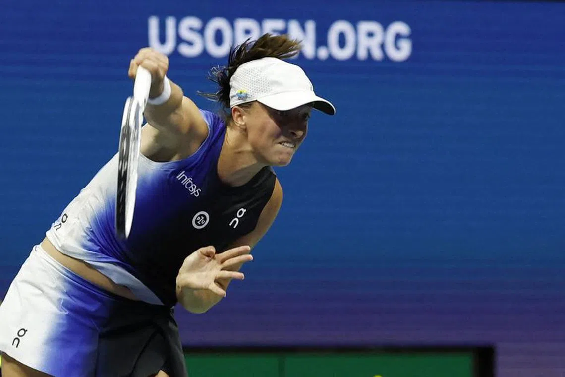 Sep 3, 2023; Flushing, NY, USA; Iga Swiatek of Poland serves against Jelena Ostapenko of Latvia (not pictured) on day seven of the 2023 U.S. Open tennis tournament at USTA Billie Jean King National Tennis Center. Mandatory Credit: Geoff Burke-USA TODAY Sports/File Photo