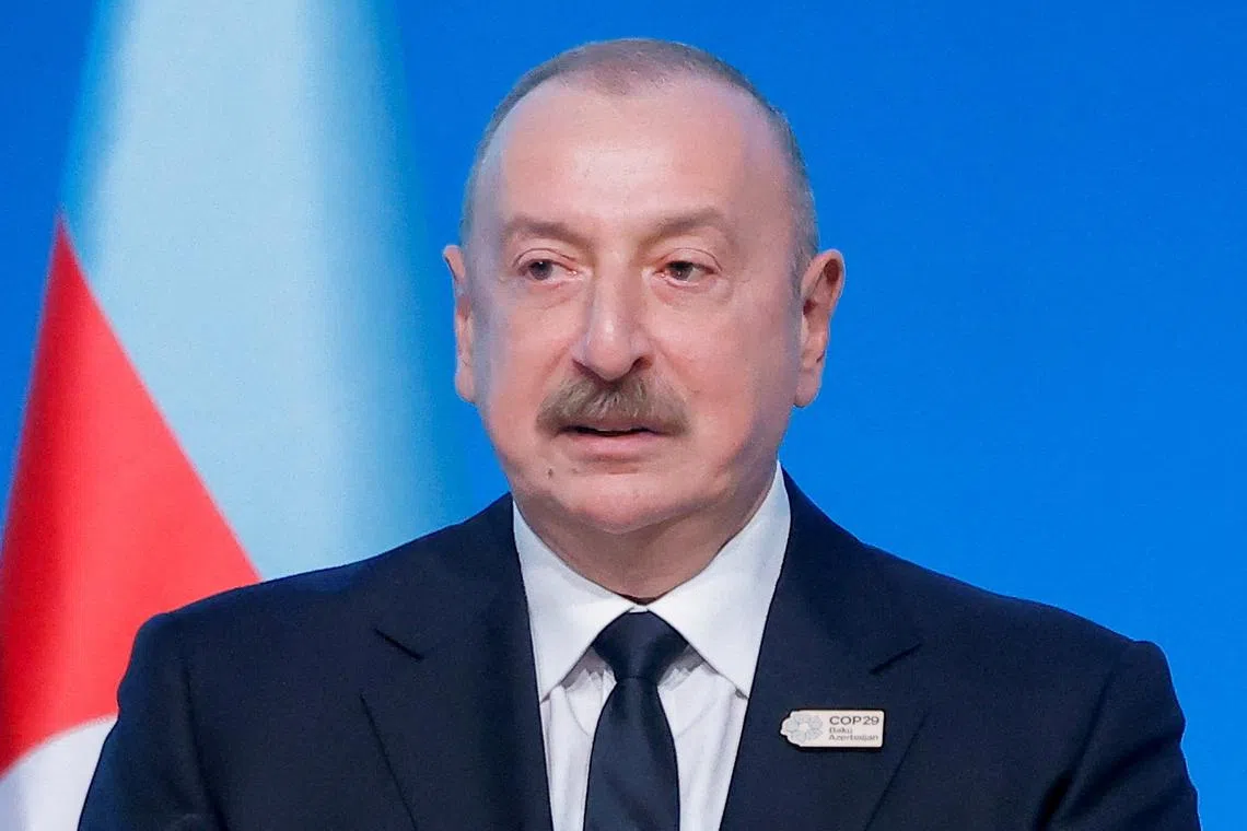 FILE PHOTO: Azerbaijan's President Ilham Aliyev speaks during the Opening Ceremony of the United Nations climate change conference COP29 in Baku, Azerbaijan November 12, 2024. REUTERS/Maxim Shemetov/File Photo
