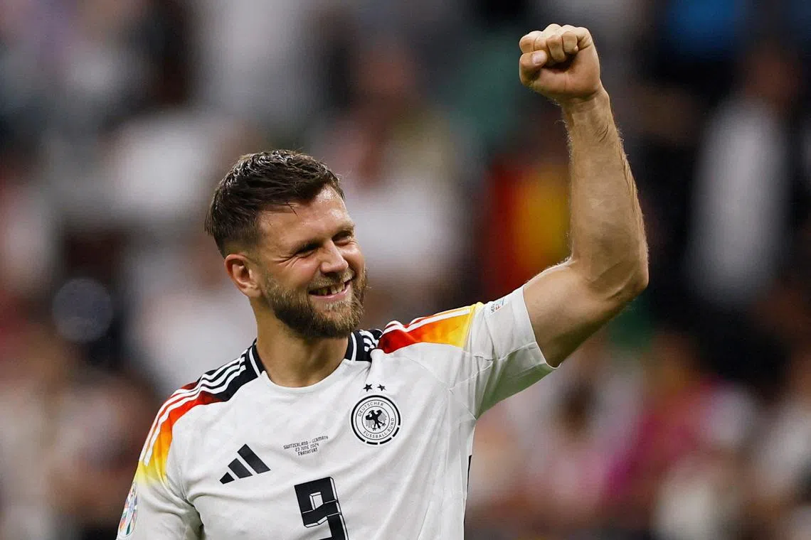 Germany's Niclas Fullkrug reacts after his Group A match against Switzerland on June 24.