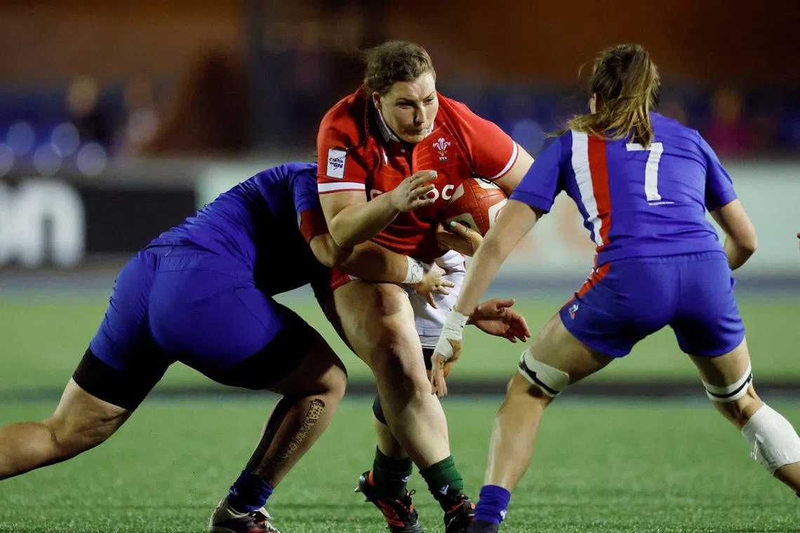 FILE PHOTO: Rugby Union - Women's Six Nations - Wales v France - Cardiff Arms Park, Cardiff, Wales, Britain - April 22, 2022 Wales' Gwenllian Pyrs in action with France's Gaelle Hermet Action Images via Reuters/John Sibley/File Photo