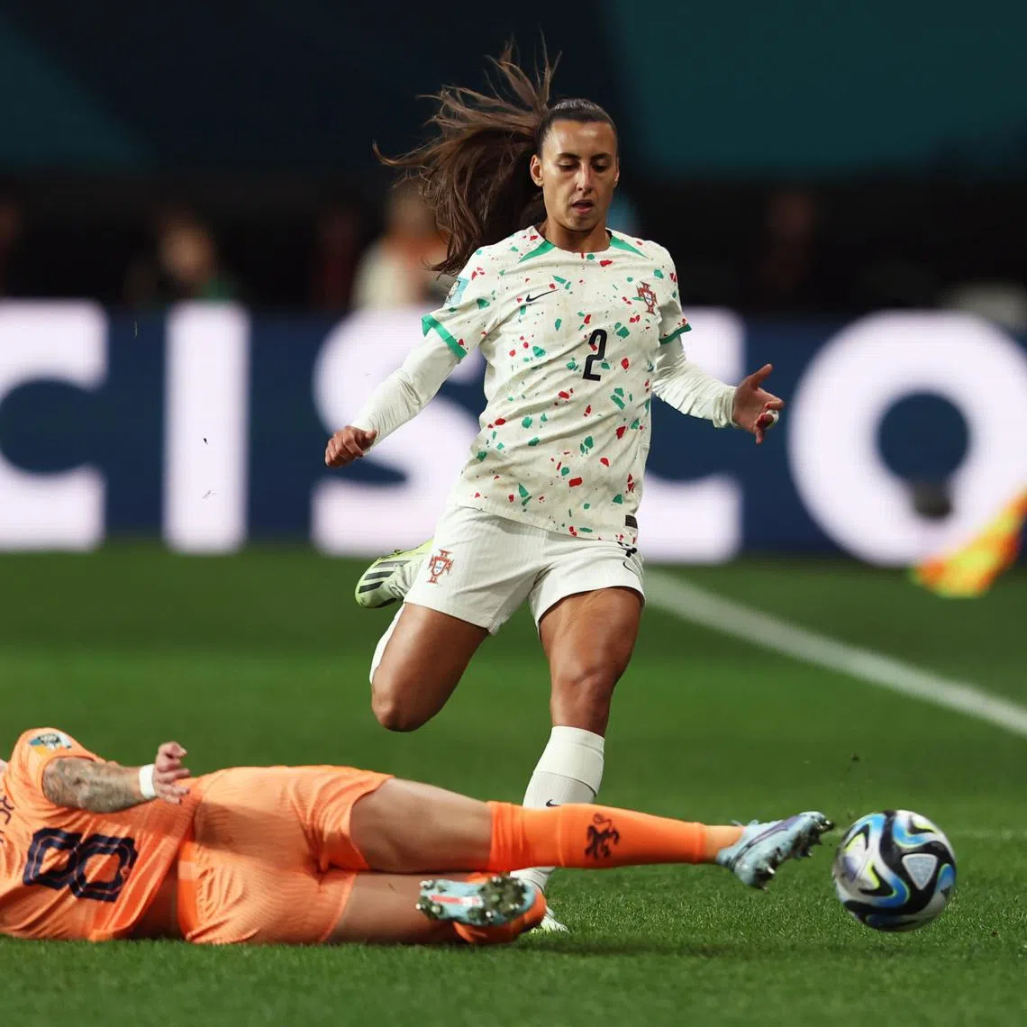 Sherida Spitse of the Netherlands in action against Catarina Amado of Portugal during their Women's World Cup match.