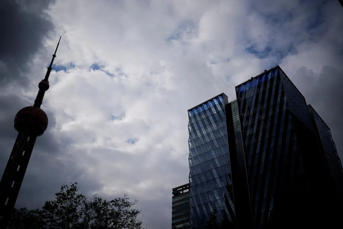 FILE PHOTO: The building of Shanghai Foxconn headquarters is pictured at the Lujiazui financial district of Pudong in Shanghai, China, November 23, 2022. REUTERS/Aly Song/File Photo