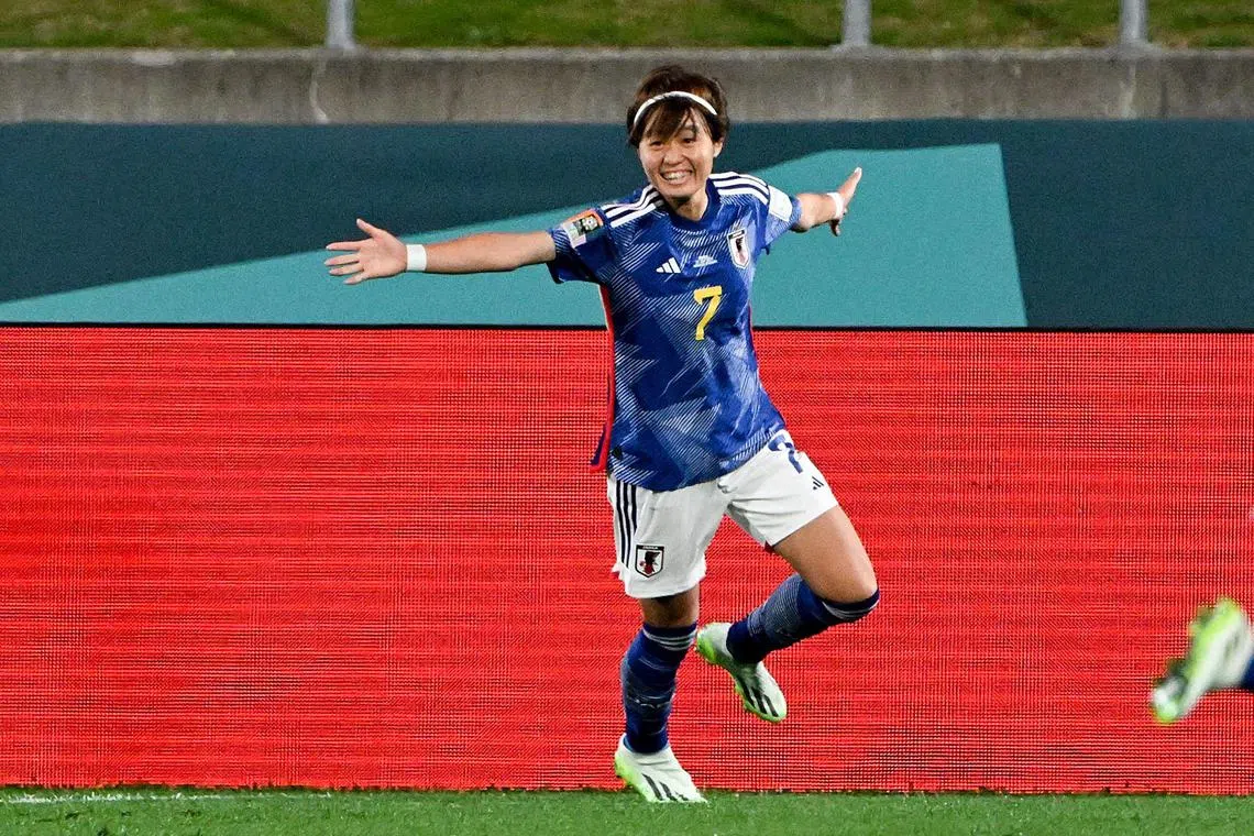 Japan midfielder Hinata Miyazawa celebrates scoring the team's first goal during the Group C match between Zambia and Japan at Waikato Stadium in Hamilton on Saturday.