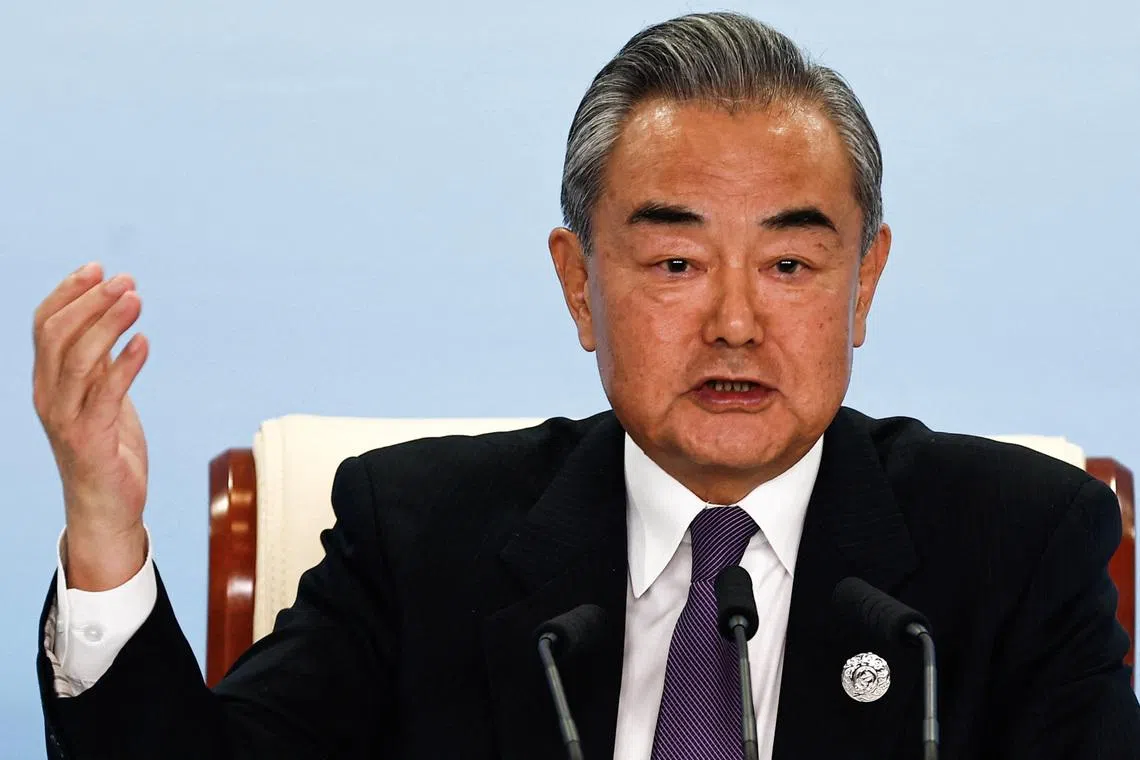 Chinese Foreign Minister Wang Yi speaks at a press conference on the sidelines of the Third Belt and Road Forum (BRF), at the media centre in Beijing, China October 18, 2023. REUTERS/Tingshu Wang