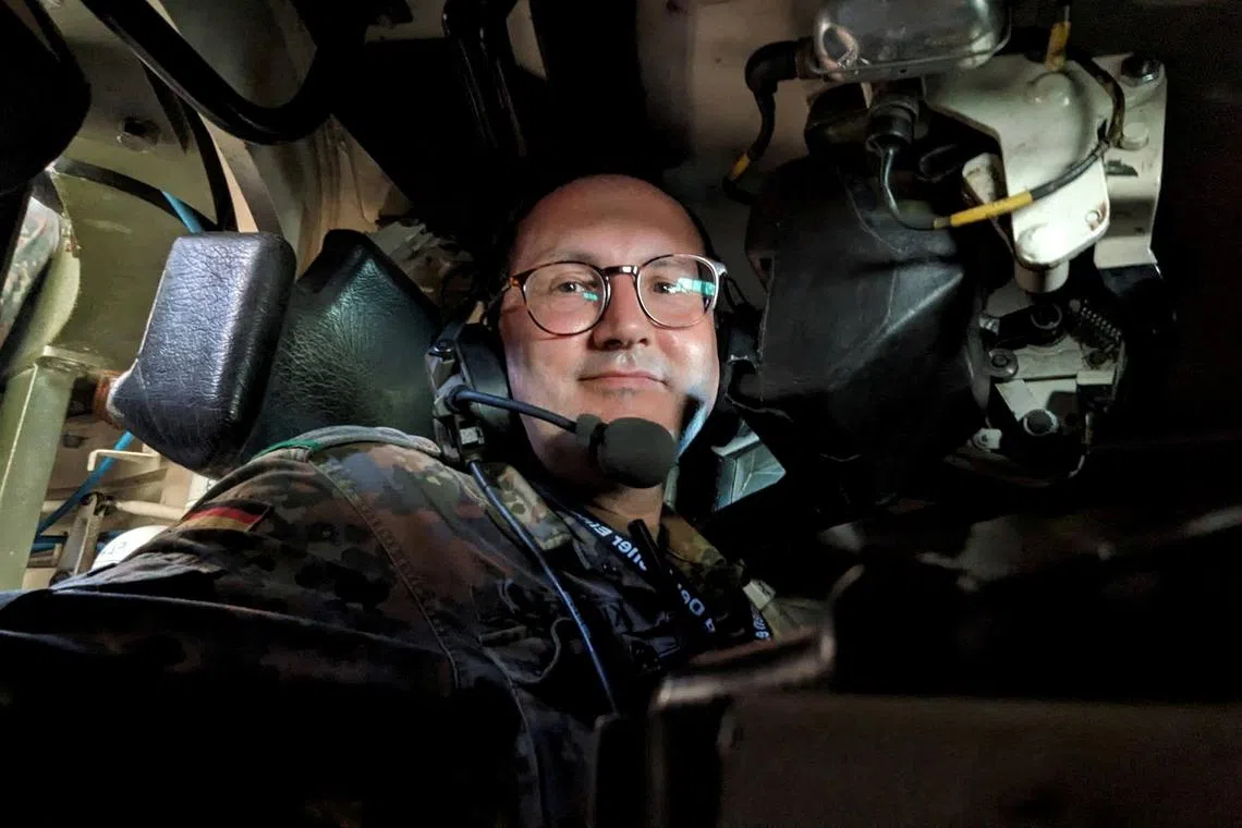 FILE PHOTO: The German Armed Forces' First Lieutenant Matt Kuppers, who later co-founded the venture capital firm Defence Invest, operates an armed combat vehicle during an exercise in a NATO military training area at an undisclosed location in Germany, May 2024. Matt Kuppers/Handout via REUTERS/ File Photo