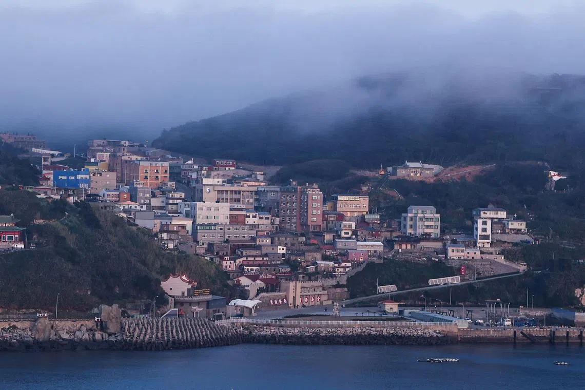 FILE PHOTO: A general view of the main residential and commercial area in Dongyin, Taiwan, March 15, 2022. Picture taken March 15, 2022. REUTERS/Ann Wang/File Photo
