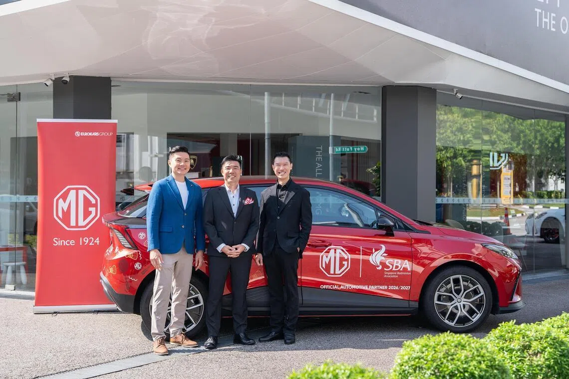 (From left) Mr Woo Kai Wei, CEO of Singapore Badminton Association, Mr Raymond Ng, managing director of MG Singapore, and Professor David Tan, vice-president (business development and communications) of Singapore Badminton Association.