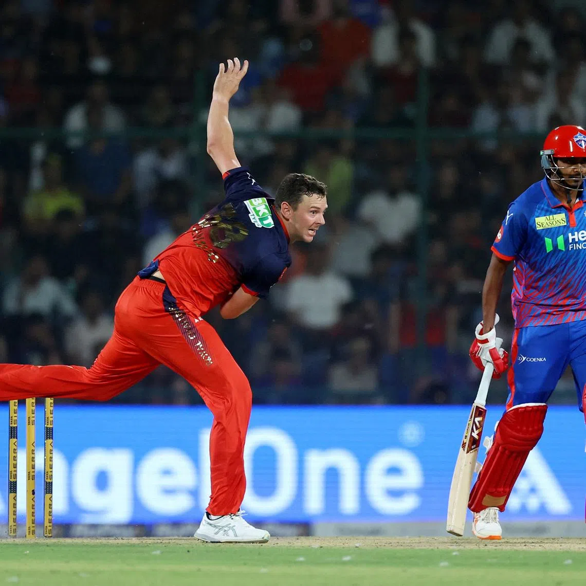 Cricket - Indian Premier League - IPL - Delhi Capitals v Royal Challengers Bengaluru - Arun Jaitley Stadium, New Delhi, India - April 27, 2026 Royal Challengers Bengaluru's Josh Hazlewood in action REUTERS/Anushree Fadnavis