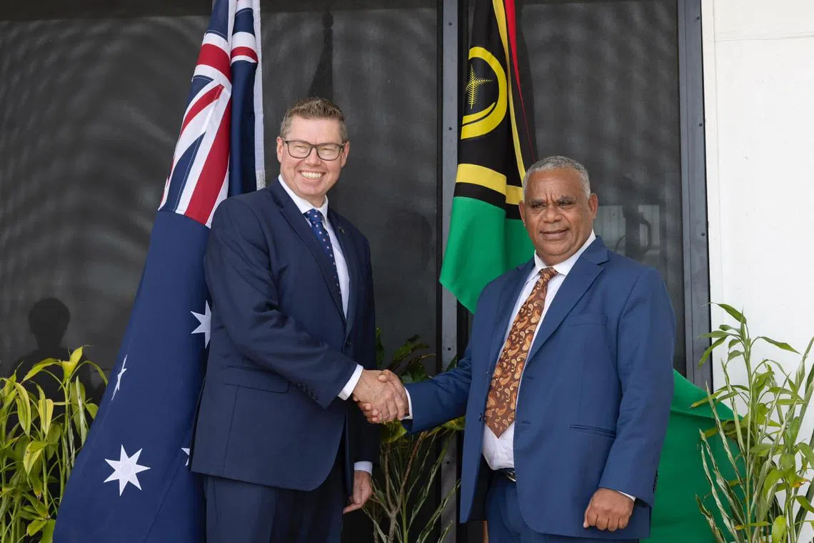 Mr Conroy (left) held talks with Vanuatu Prime Minister Jotham Napat and pledged to remain another US$3.2 million (S$4.29 million) in direct budget support for Vanuatu. 
