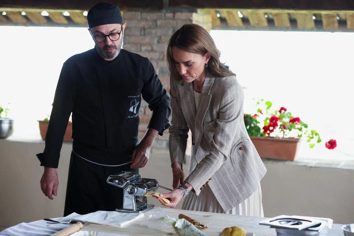 Britain's Kate, Princess of Wales, helps prepare lunch at rural Agriturismo 'Al Vigneto' as she concludes a two-day visit to the region, in Felino, in the province of Parma, Italy, May 14, 2026. REUTERS/Phil Noble/Pool